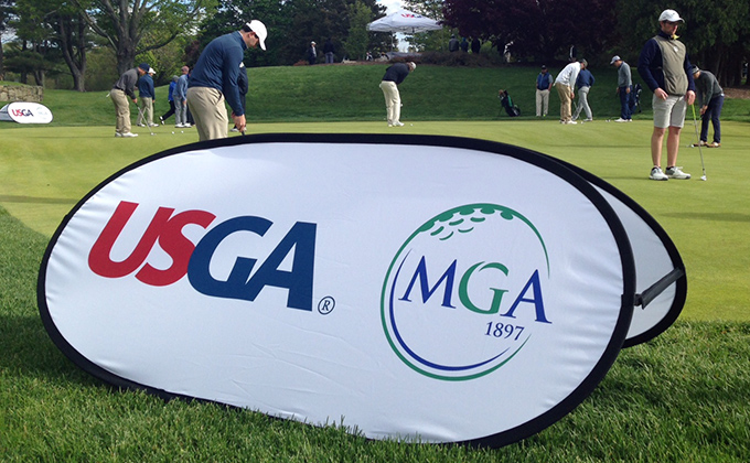 MGA USGA Logo banner on putting green