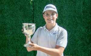 golfer holding trophy