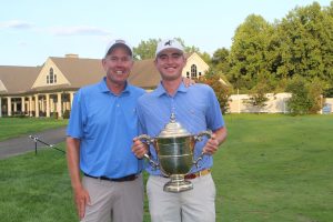 golfer holding trophy