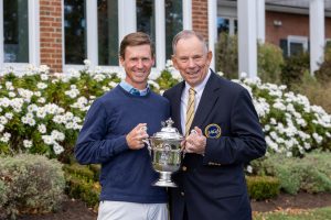 golfer holding trophy